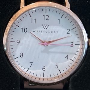 Brand new! In box! Pink Wristology Watch in box. Never worn